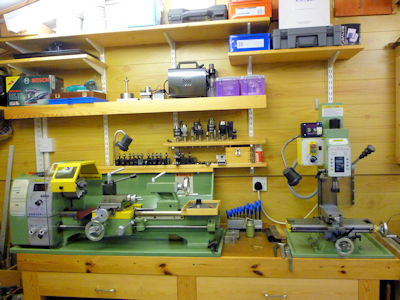lathe and mill with shelves above